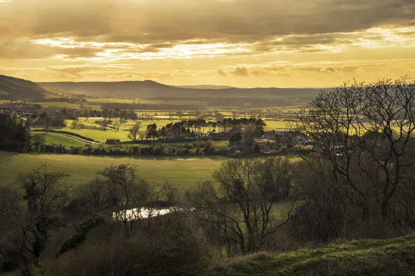 Beautiful landscape image of sunset over countryside landscape i — Stock Photo, Image