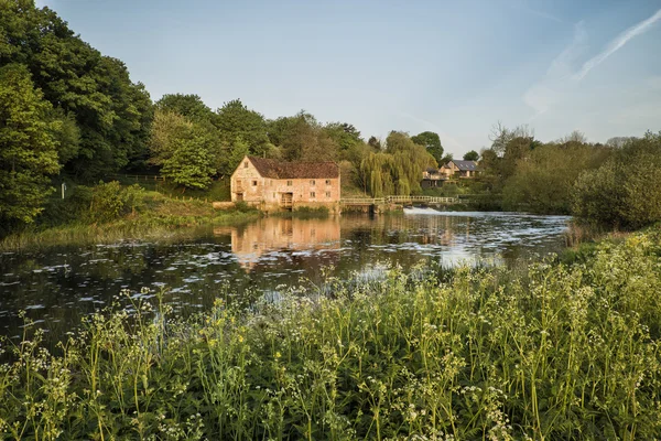 Early morning landscape across River to old water Mill — Stock Photo, Image