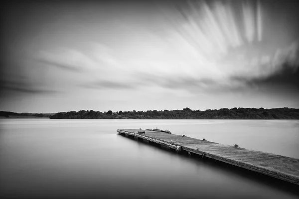 Landscape image at sunset of leisure boats moored on jetty in la — Stock Photo, Image