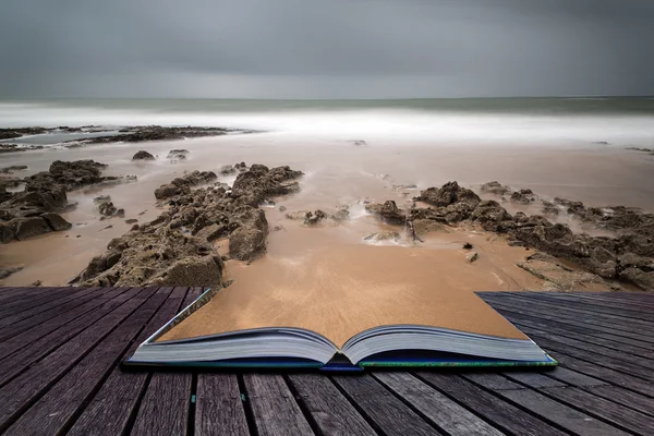 Long exposure landscape beach scene with moody sky conceptual bo — Stock Photo, Image