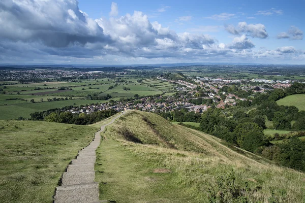 View from top of Glastonbury Tor overlooking Glastonbury town in — Stock Photo, Image