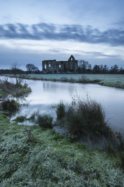 Beautiful sunrise landscape of Priory ruins in countryside locat — Stock Photo, Image