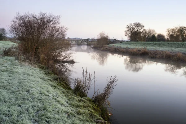 Landscape Winter surnise of river and frosty fields — Stock Photo, Image