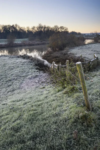 Landscape Winter surnise of river and frosty fields — Stock Photo, Image