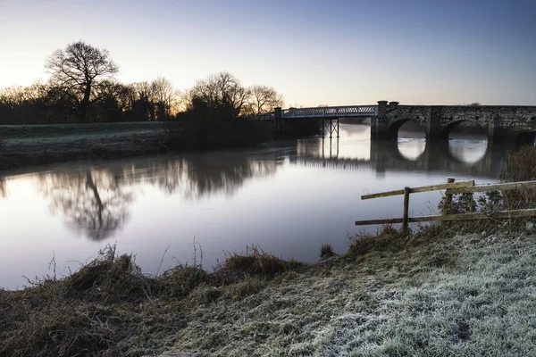 Landscape Winter surnise of river and frosty fields — Stock Photo, Image