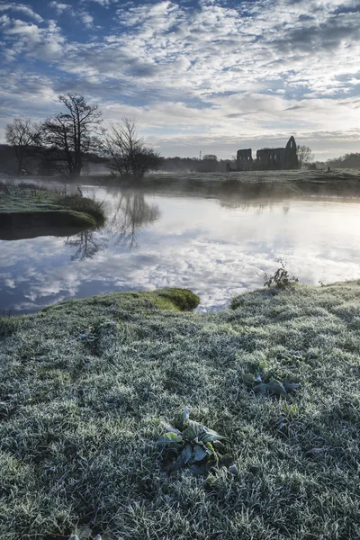 Beautiful sunrise landscape of Priory ruins in countryside locat — Stock Photo, Image