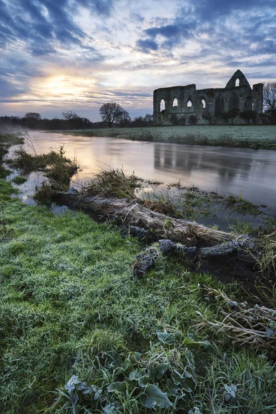 Beautiful sunrise landscape of Priory ruins in countryside locat — Stock Photo, Image