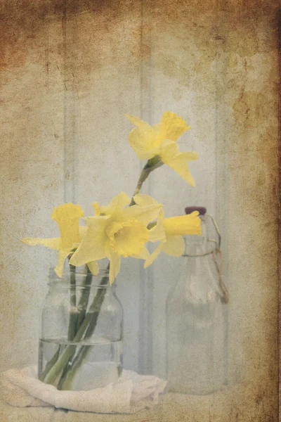 Still life image of Spring flowers with vintage texture filter e — Stock Photo, Image