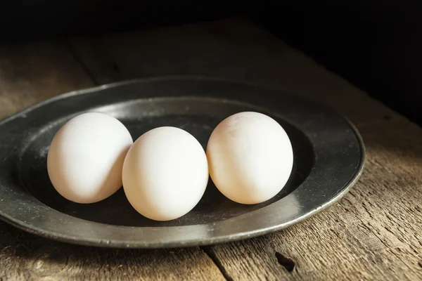 Fresh duck eggs in moody vintage retro style natural lighting se — Stock Photo, Image
