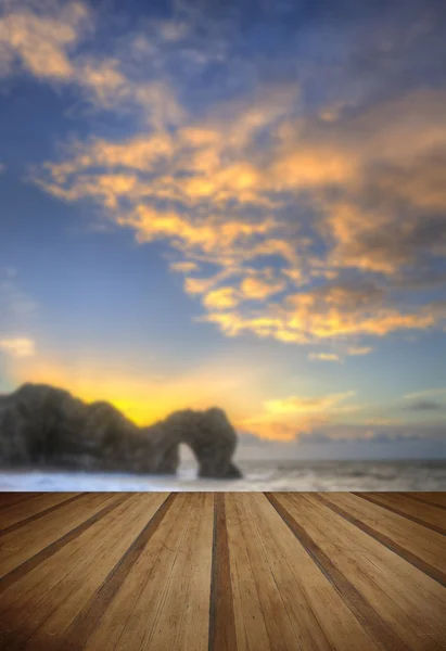 Colorate albe invernali dietro Durdle Door sulla costa giurassica i — Foto Stock