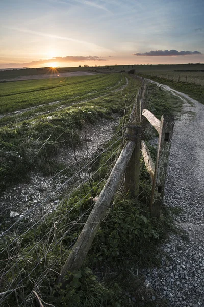 Beautiful Spring landscape of gate leading footpath into fields — Stock Photo, Image