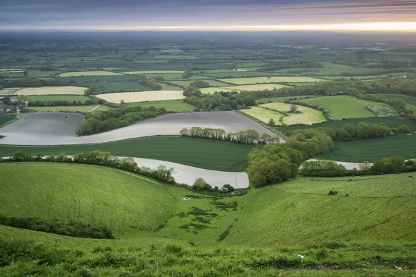 Morning over rolling English countryside landscape in Spring — Stock Photo, Image