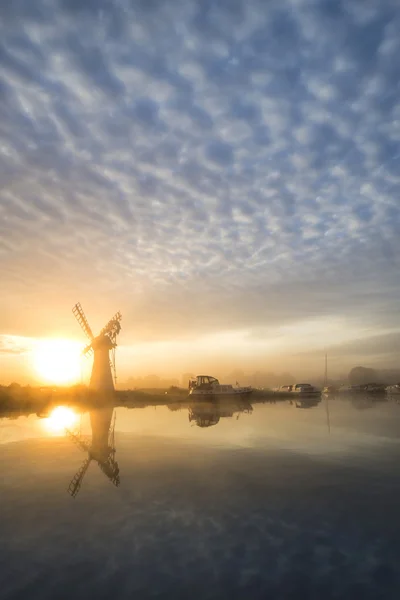 Stunnnig landscape of windmill and river at dawn on Summer morni — Stock Photo, Image