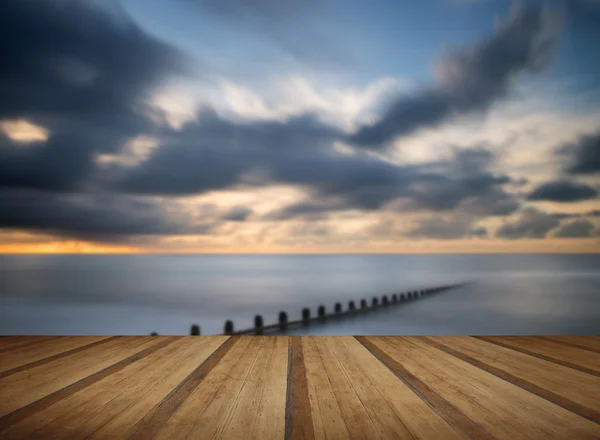 Beautiful long exposure vibrant concept image of ocean at sunset — Stock Photo, Image