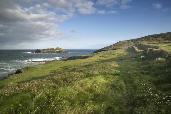 Beautiful sunrise landscape image of Godrevy in Corwnall England — Stock Photo, Image