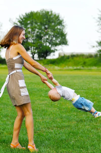 Mom plays with son — Stock Photo, Image