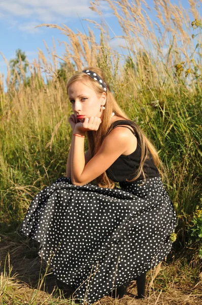 Sitting portrait of beautiful woman — Stock Photo, Image