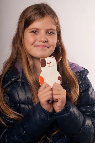 Menina com biscoito — Fotografia de Stock