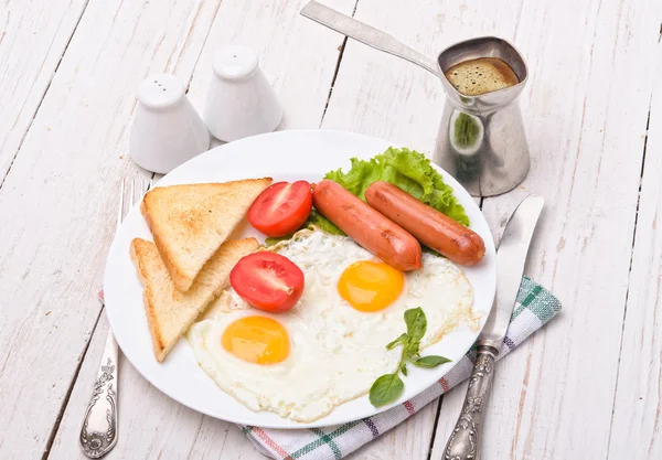 Breakfast with fried eggs. — Stock Photo, Image