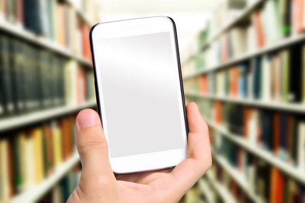 Mãos tirando biblioteca de fotos com smartphone . — Fotografia de Stock
