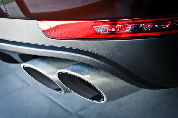 Close up of a car dual exhaust pipe Stock Picture