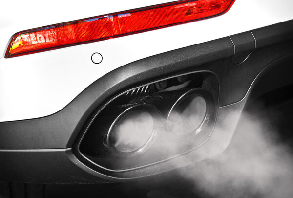 Close up of a car dual exhaust pipe