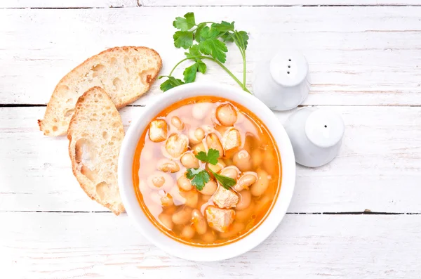 Bean soup on a wooden table. — Stock Photo, Image