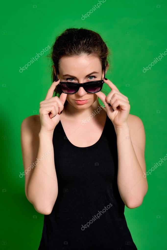 Young Woman Looking Over Sunglasses Stock Photo C Sokolander Young Woman Looking Over Sunglasses Stock Photo C Sokolander