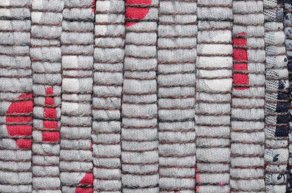 Close up varicolored knitted carpet background — Stock Photo, Image