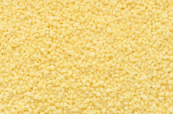 Close up couscous grains background — Stock Photo, Image