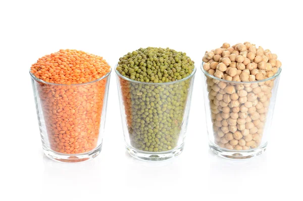 Full glasses with mung, lentil and chick-pea isolated on white — Stock Photo, Image