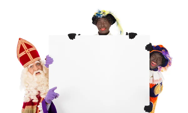 Sinterklaas and Black Pete with whiteboard — Stock Photo, Image