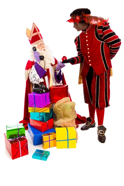 Sinterklaas und zwarte piet mit telefon — Stockfoto