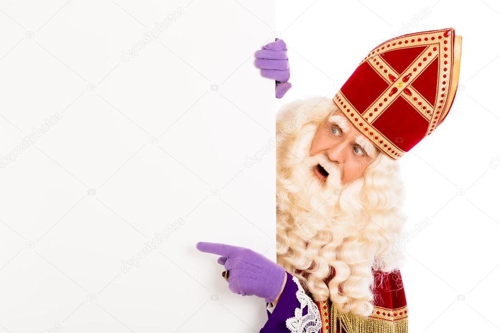 Sinterklaas pointing on placard