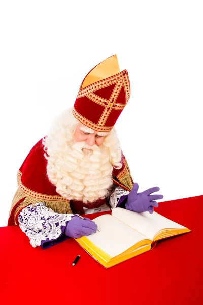 圣诞老人与书 — 图库照片