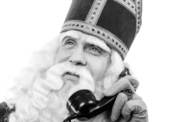 Sinterklaas with telephone.Monochrome