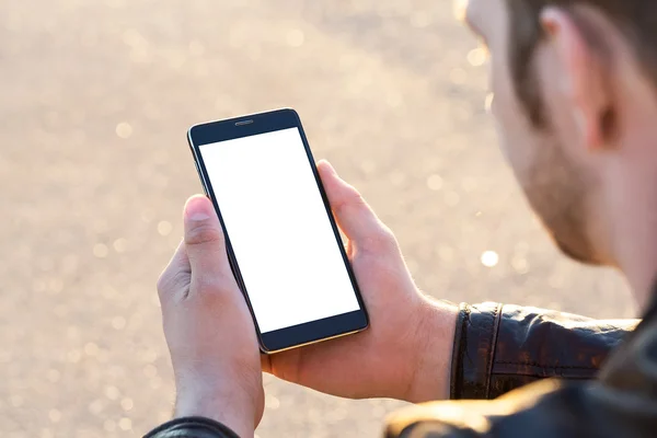 Man uses his Mobile Phone outdoor — Stock Photo, Image