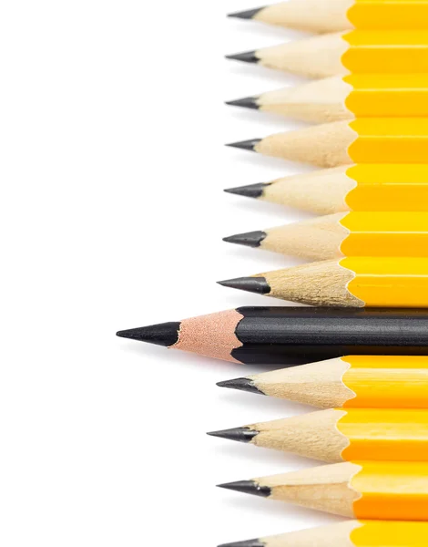 Yellow pencils with on black pencil — Stock Photo, Image