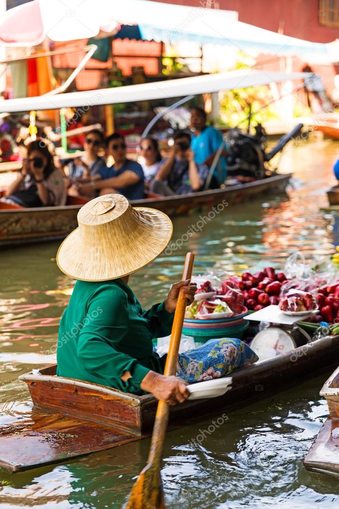 Traditional floating market in Damnoen Saduak near Bangkok.