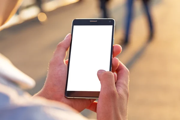 Man uses his Mobile Phone outdoor — Stock Photo, Image