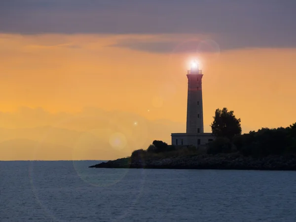 Faro al atardecer —  Fotos de Stock