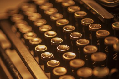 Antique typewriter keys in sepia