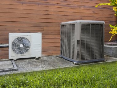 Two air conditioning heat pumps