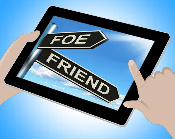Tablet inimigo amigo significa inimigo ou aliado — Fotografia de Stock