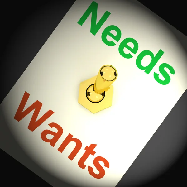 Needs Wants Switch Shows Requirements and Luxuries — стоковое фото