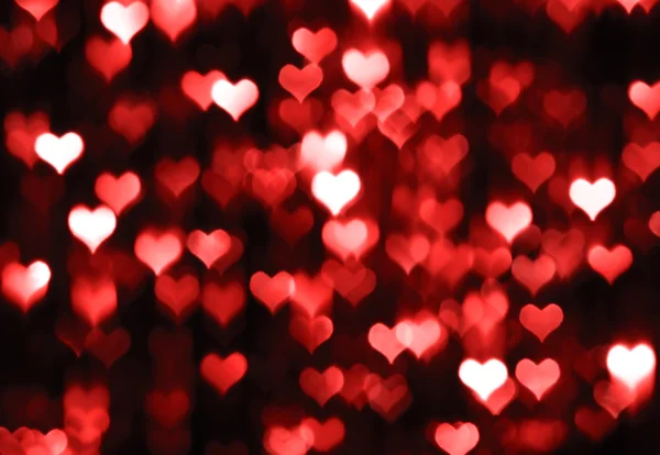 Abstracte donkere valentine achtergrond met rode harten — Stockfoto