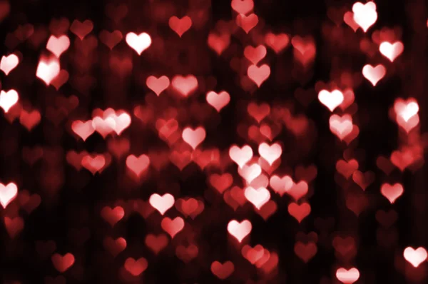 Abstract dark valentine background with red hearts Stock Photo