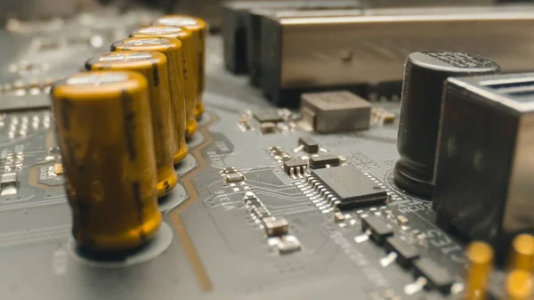 Motherboard close up photo with transistors — Stock Photo, Image
