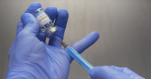 Vaccine in human hands closeup footage — Stock Video
