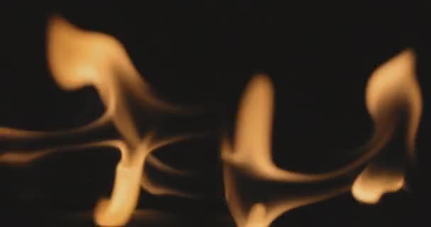 Fire dance against dark background 120fps slow motion loopable footage — Stock video